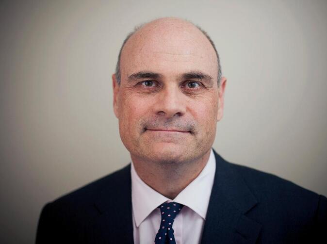 CEO AIG Peter Hancock odstupuje z funkcie